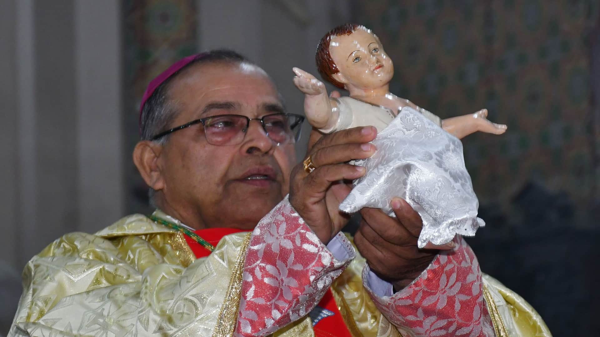 Happy Christmas: Church bells ring during midnight service, churches illuminated with candlelight