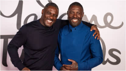 Idris Elba Getting Shocked When He Uses His Lifelike Wax Statue To Unlock His Own Smartphone At Madame Tussaud