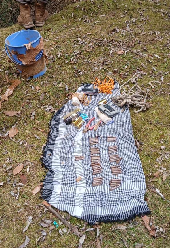 Hideout busted in north Kashmir forest area, Security forces recover arms, ammunition, explosive material duri