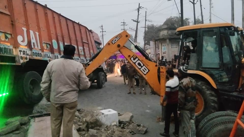 UP News Bolero driver head crushed after being trapped under a truck 22 bones broken