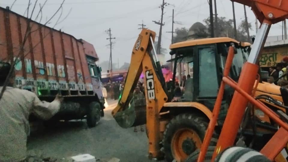 UP News Bolero driver head crushed after being trapped under a truck 22 bones broken