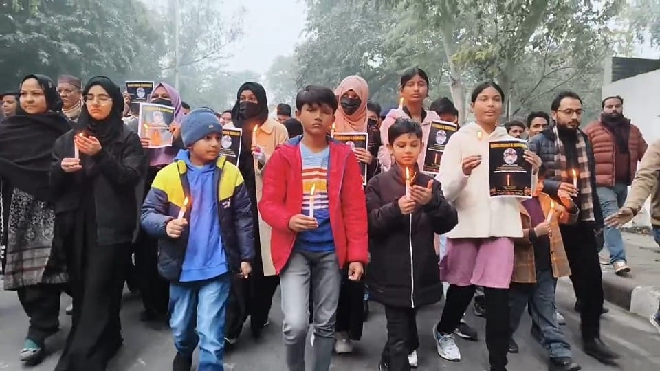 Candle march held to protest murder of AMU teacher