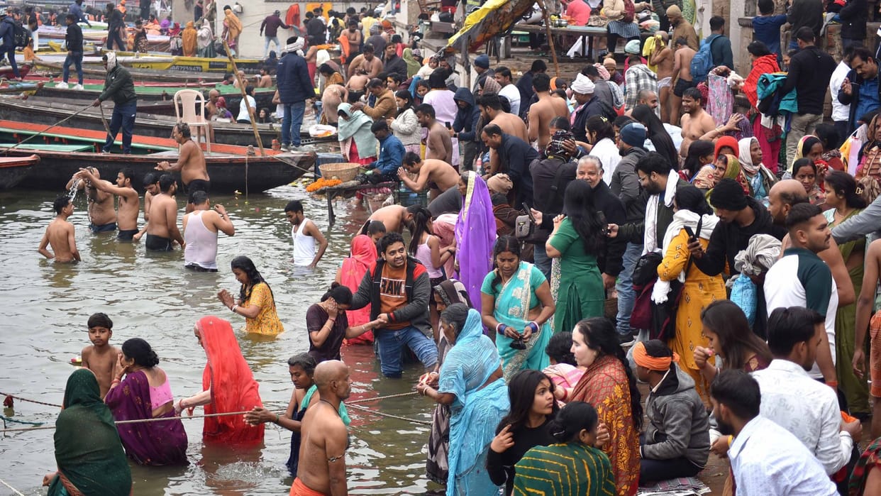 Paush Purnima Devotees take dip faith amidst cold winds drizzle strict security arrangements were in place