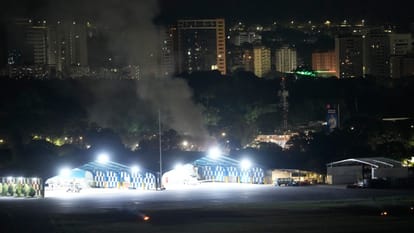 Donald Trump confirm military strikes on venezuela President Nicolas Maduro wife captured flown out of Country