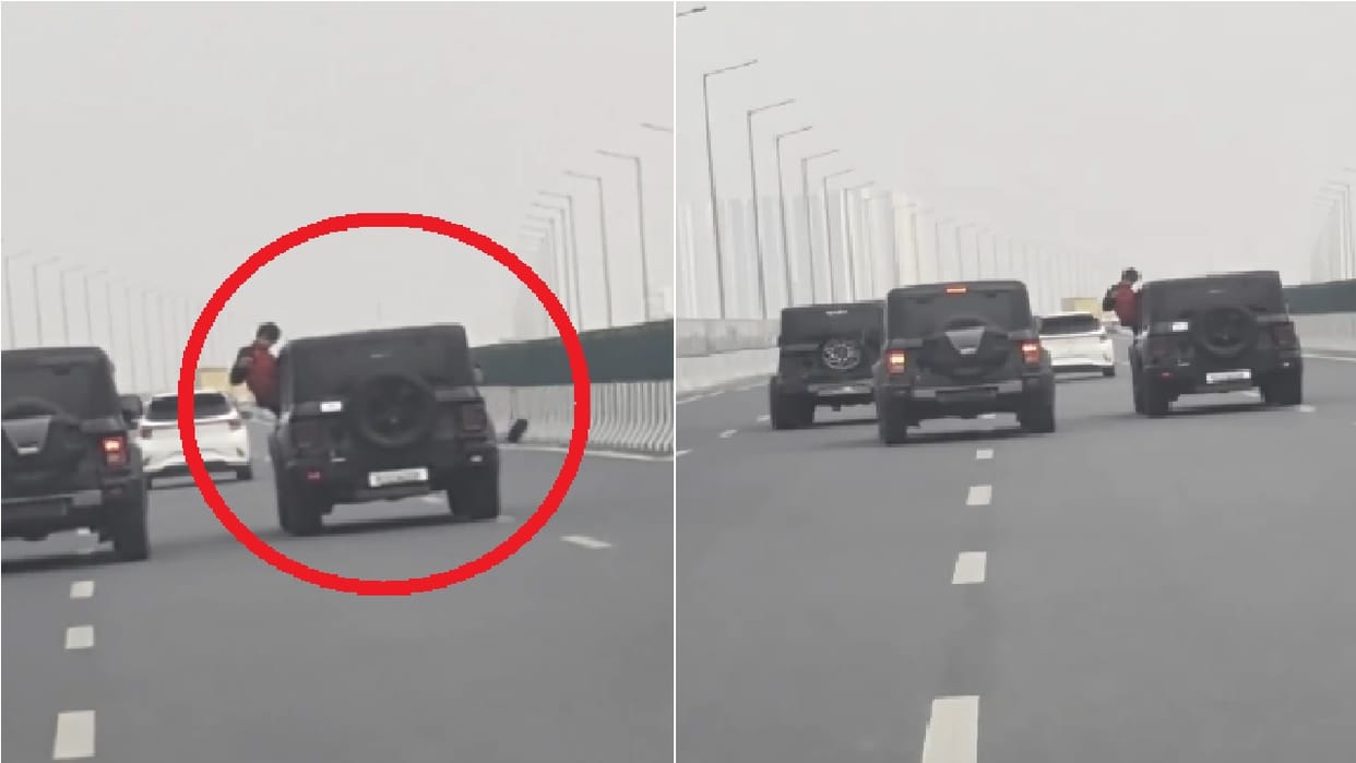 Young man performed a stunt by jumping out of twindow of moving Thar on Dwarka Expressway