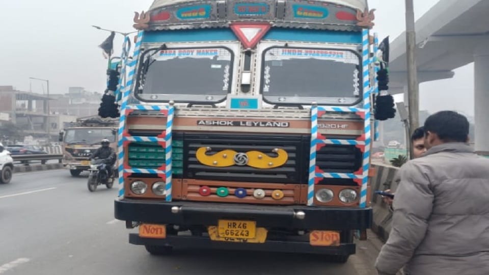 up road accident: motorcyclist was killed in collision with container truck on highway
