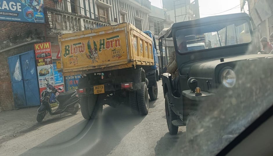 Despite the 'no entry' restrictions in Haldwani, dump trucks are still plying the roads