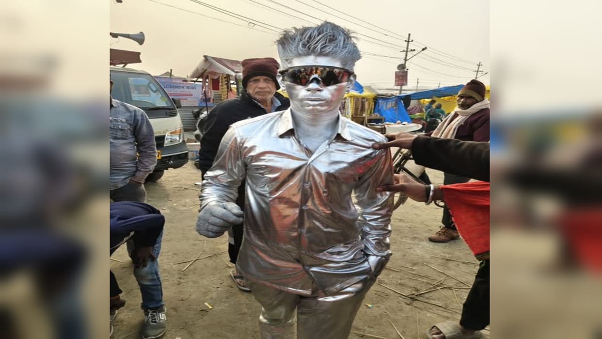 Silver Boy is becoming the centre of attraction in the fair, he stands for five hours every day.
