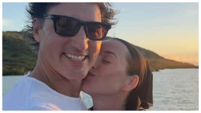 Katy Perry Kisses Justin Trudeau tags ex Orlando Bloom in same post