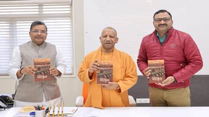 CM Yogi Adityanath Releases Book Sanatan Ka Mahakumbh Highlighting Cultural Grandeur of Mahakumbh 2025
