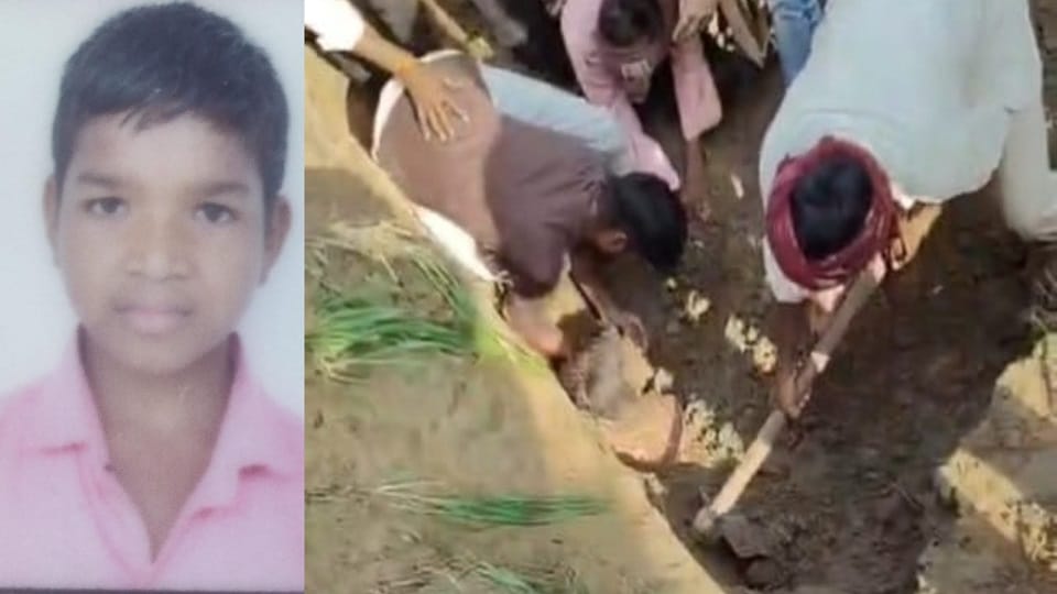 11 year old boy died after being buried under pile of soil