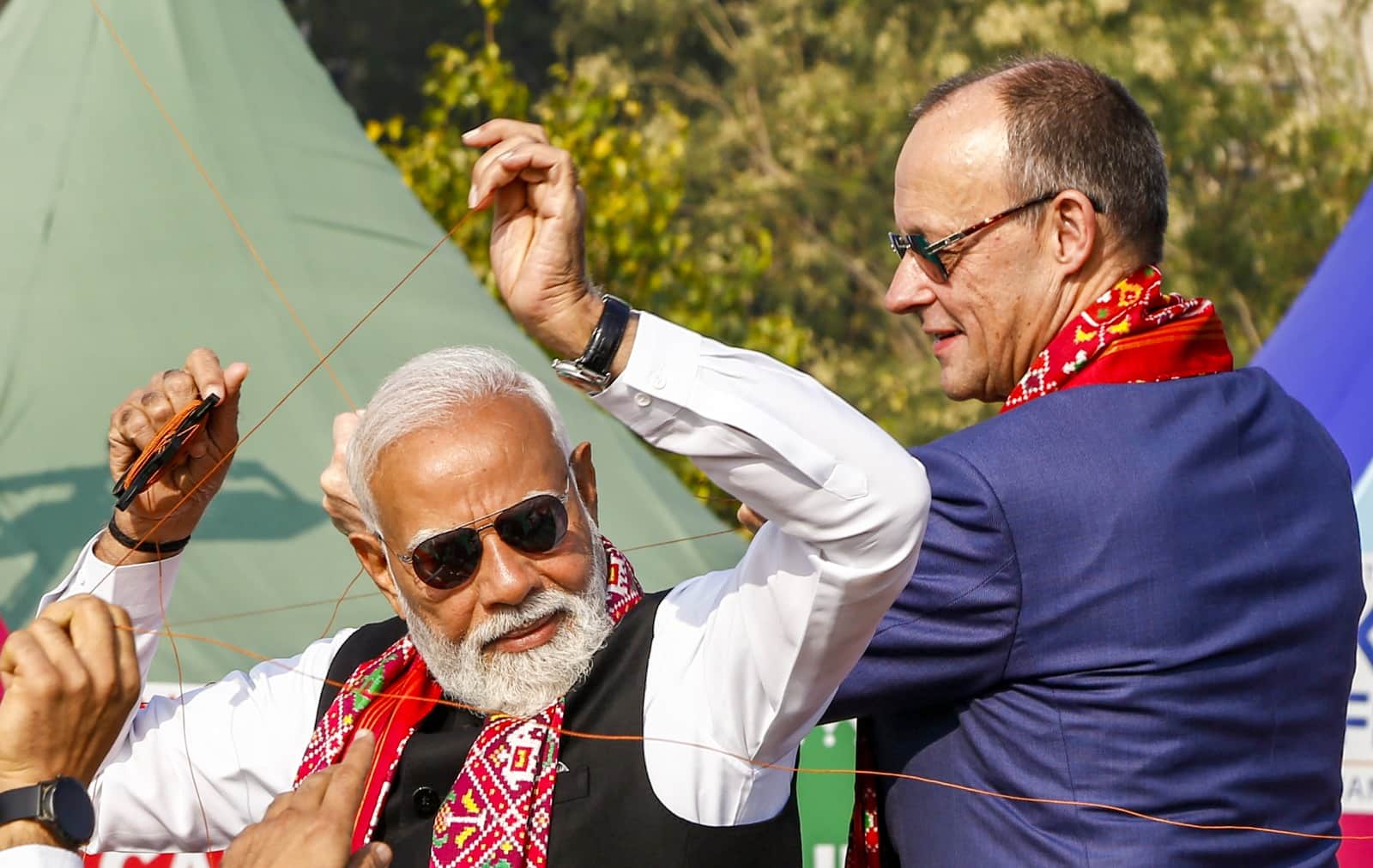 German Chancellor In India Photos: Meet With PM Modi, International Kites Festival and other Events