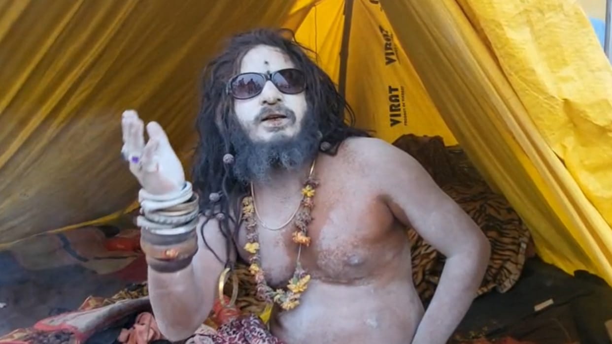 Prayagraj Magh Mela: Saint Baba is making waves at the Magh Mela, distributing devotional essence on the sand.