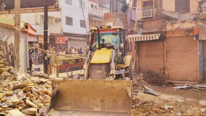 Bulldozer action on begun at Dalmandi Demolition work with houses razed from direction of square
