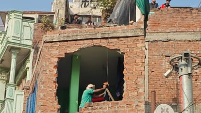 Bulldozer action on begun at Dalmandi Demolition work with houses razed from direction of square