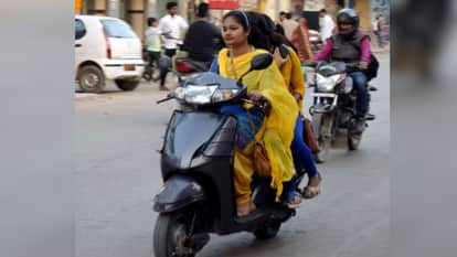 road safety awareness campaign in Varanasi girls not wearing helmet due to makeup
