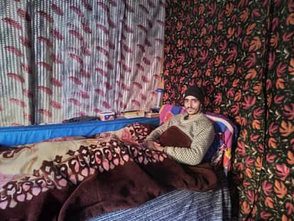 Bilal Ahmed, who cleaned Wular Lake during his teenage years, is now waiting for a government job after losing