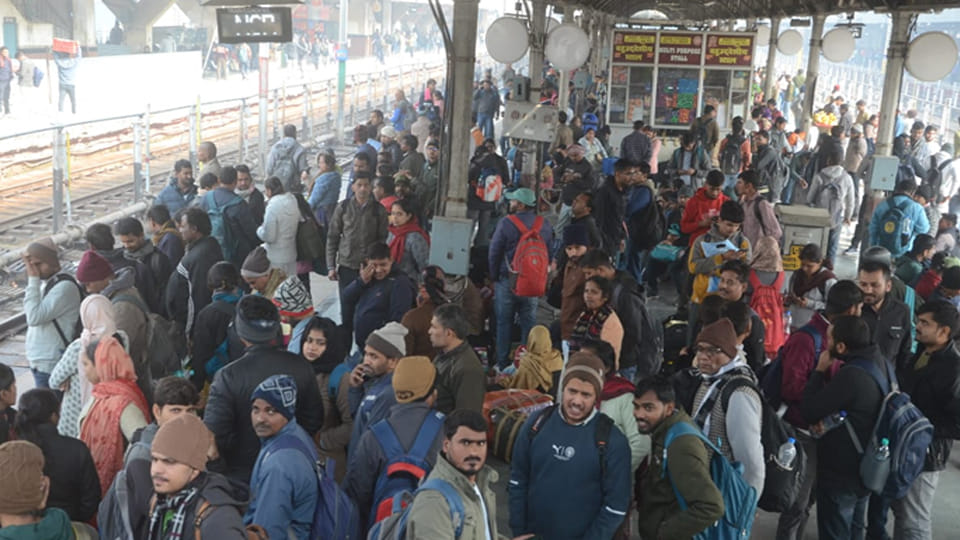 Kanpur: Trains overrun by exam candidates, hanging from doors, crammed into toilets