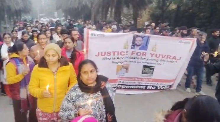 Noida software engineer death case People hold candlelight march demanding justice