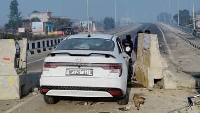 Car collides with boulders placed on an under-construction overbridge in lakhimpur kheri
