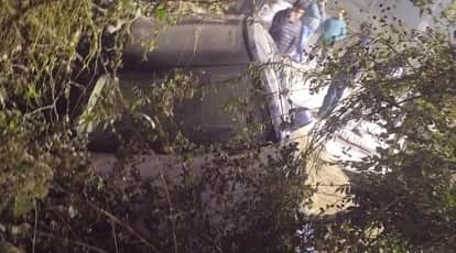 Kanpur BMW broke through railing and crashed into field it was traveling at 100 km/h driver was injured