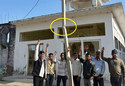 Broken electricity pole in front of the temple