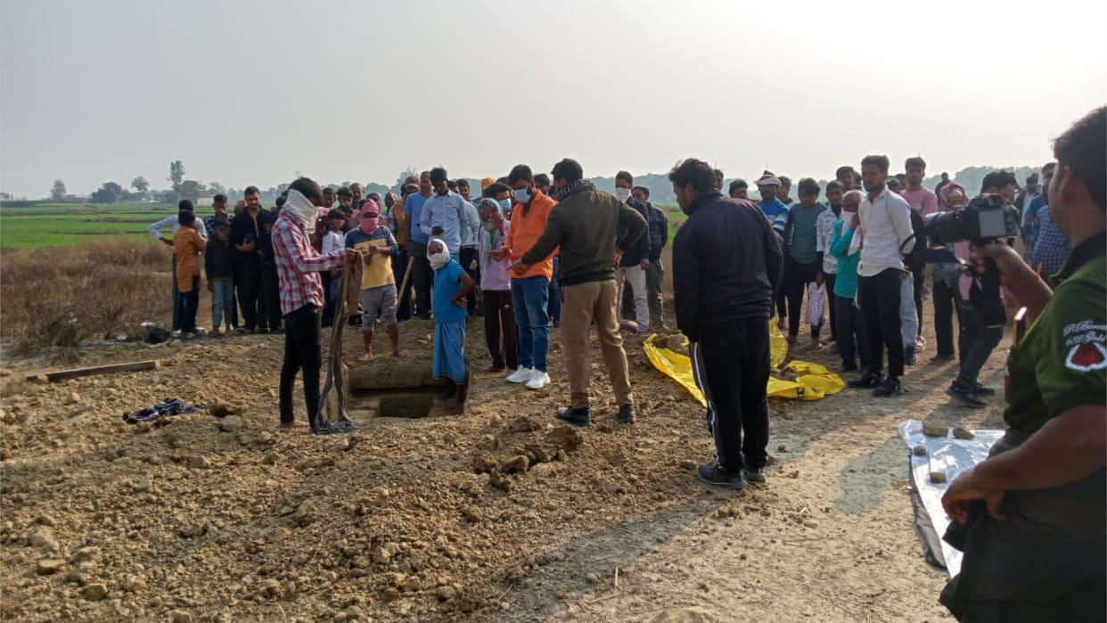 The body of a young man was exhumed from his grave; the post-mortem report will solve the mystery.