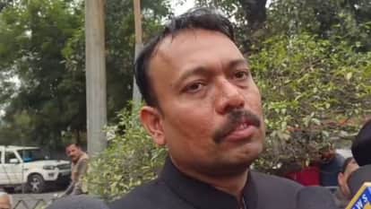 PCS Officer Alankar Agnihotri sitting on dharna outside the Collectorate in Bareilly