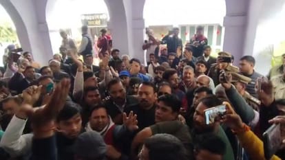 PCS Officer Alankar Agnihotri sitting on dharna outside the Collectorate in Bareilly