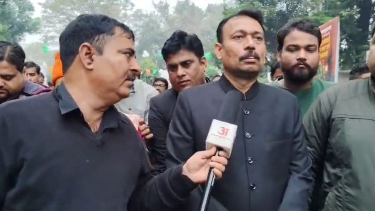 PCS Officer Alankar Agnihotri sitting on dharna outside the Collectorate in Bareilly