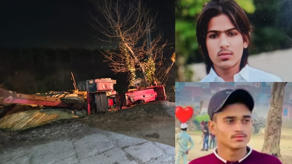Two boys died when an overloaded tractor-trailer carrying hay overturned into an open drain