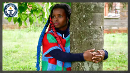Truphena Muthoni sets Guinness World Record, stands hugging a tree for 72 hours