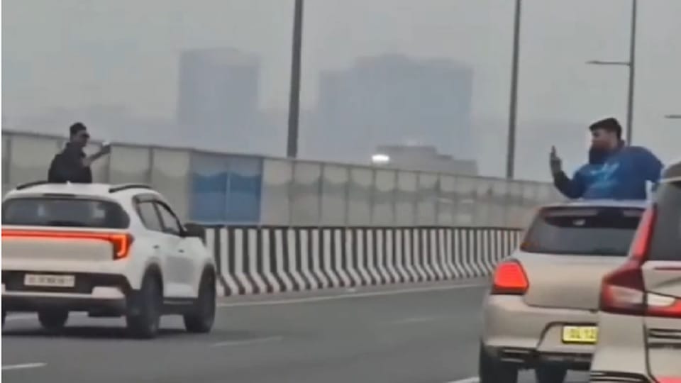 Young men made videos with the sunroofs open in two cars on the Dwarka Expressway