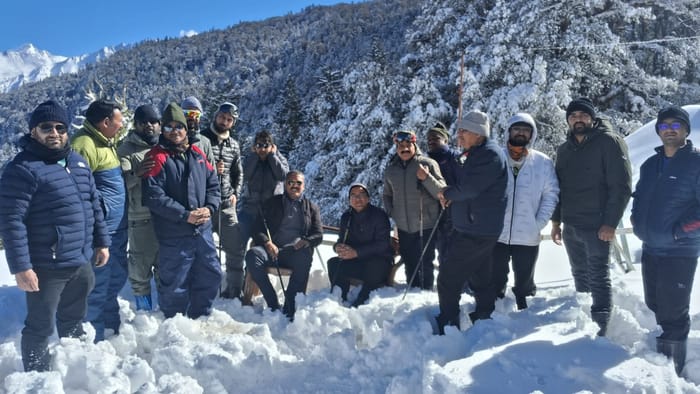 Snowfall Gangotri Yamunotri shrines covered white blanket of snow snowfall Harsil Kharsali Auli watch photos