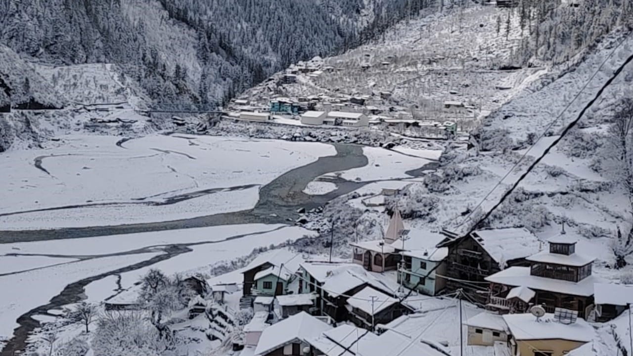 Snowfall Gangotri Yamunotri shrines covered white blanket of snow snowfall Harsil Kharsali Auli watch photos