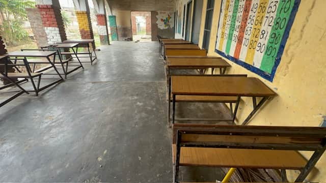 Children play marbles at government school in Gokalpur 500 students on paper only 10 found teacher absent