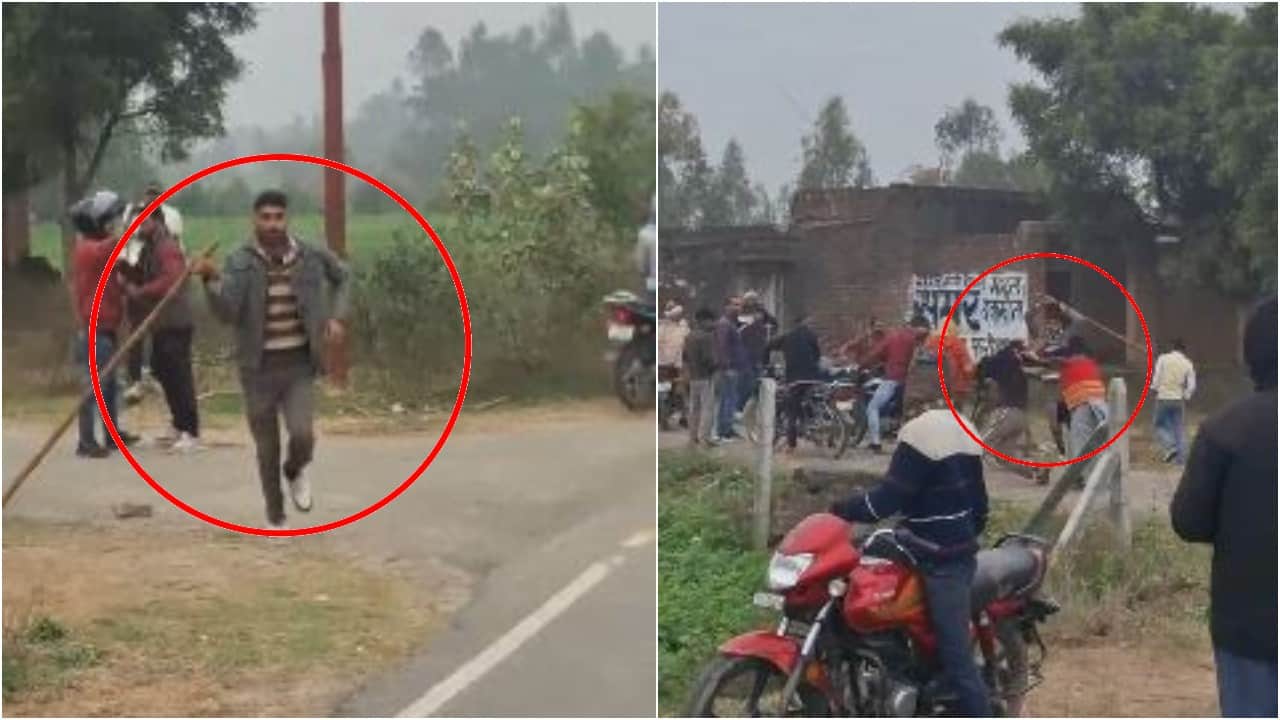 लाठी लेकर दौड़ता आरोपी