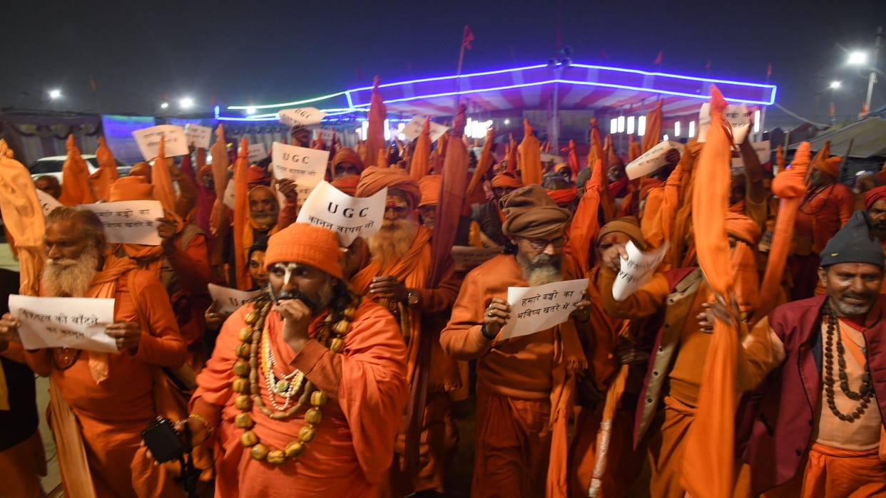 Angry saints protest against UGC rules at Magh Mela, take out candle march