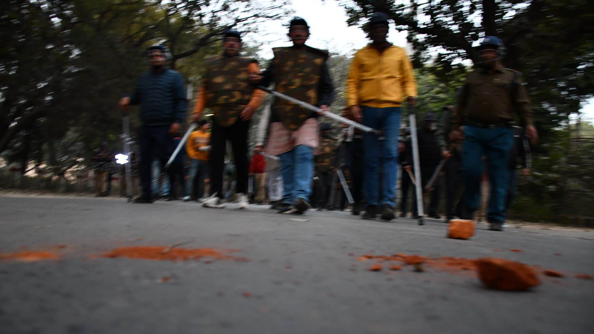 BHU 10 pictures of unrest Stone and bricks thrown between two groups of students in varanasi