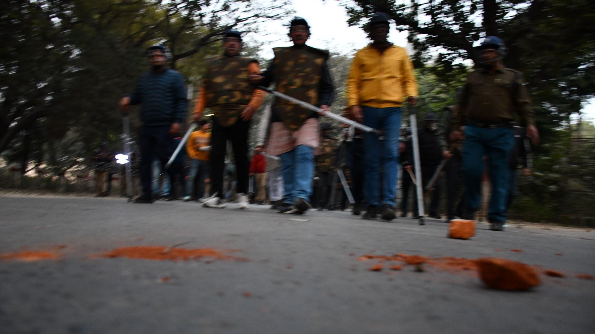 BHU 10 pictures of unrest Stone and bricks thrown between two groups of students in varanasi