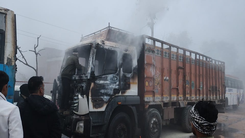 A truck parked near a petrol pump caught fire