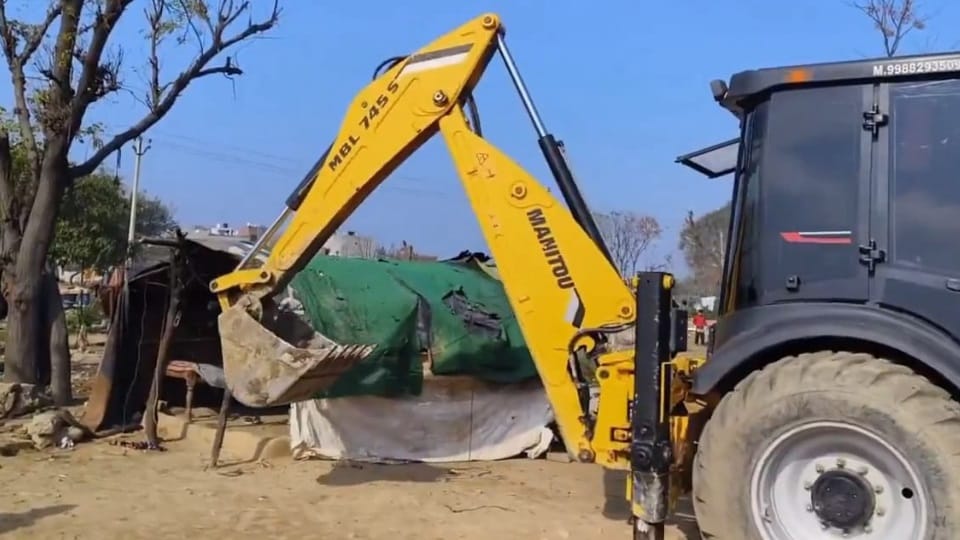 Barnala Municipal Improvement Trust removed huts from 25 acres of land