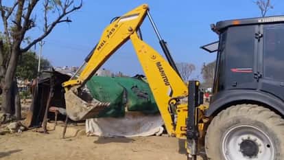 Barnala Municipal Improvement Trust removed huts from 25 acres of land