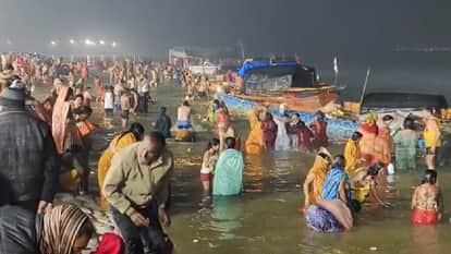 Prayagraj: Devotees take a holy dip in the Sangam on Maghi Purnima.