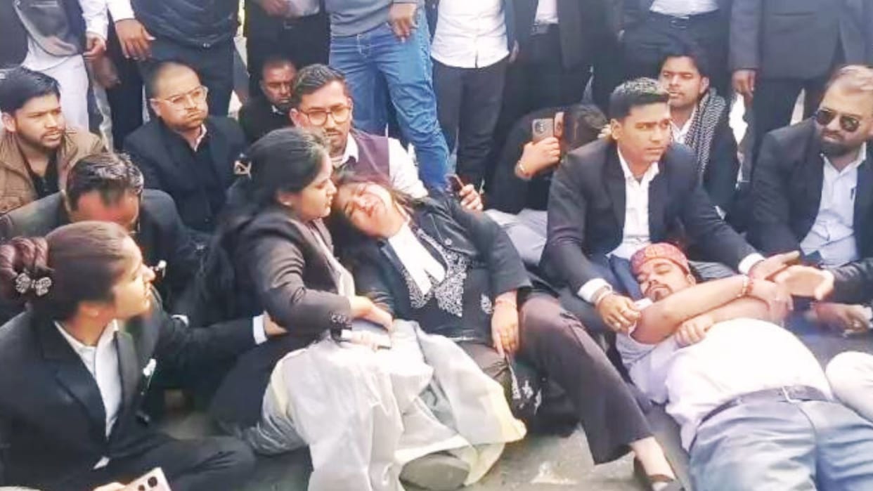Brawl at toll booth lawyers take to streets hold procession burn an effigy stage sit-in police arrive