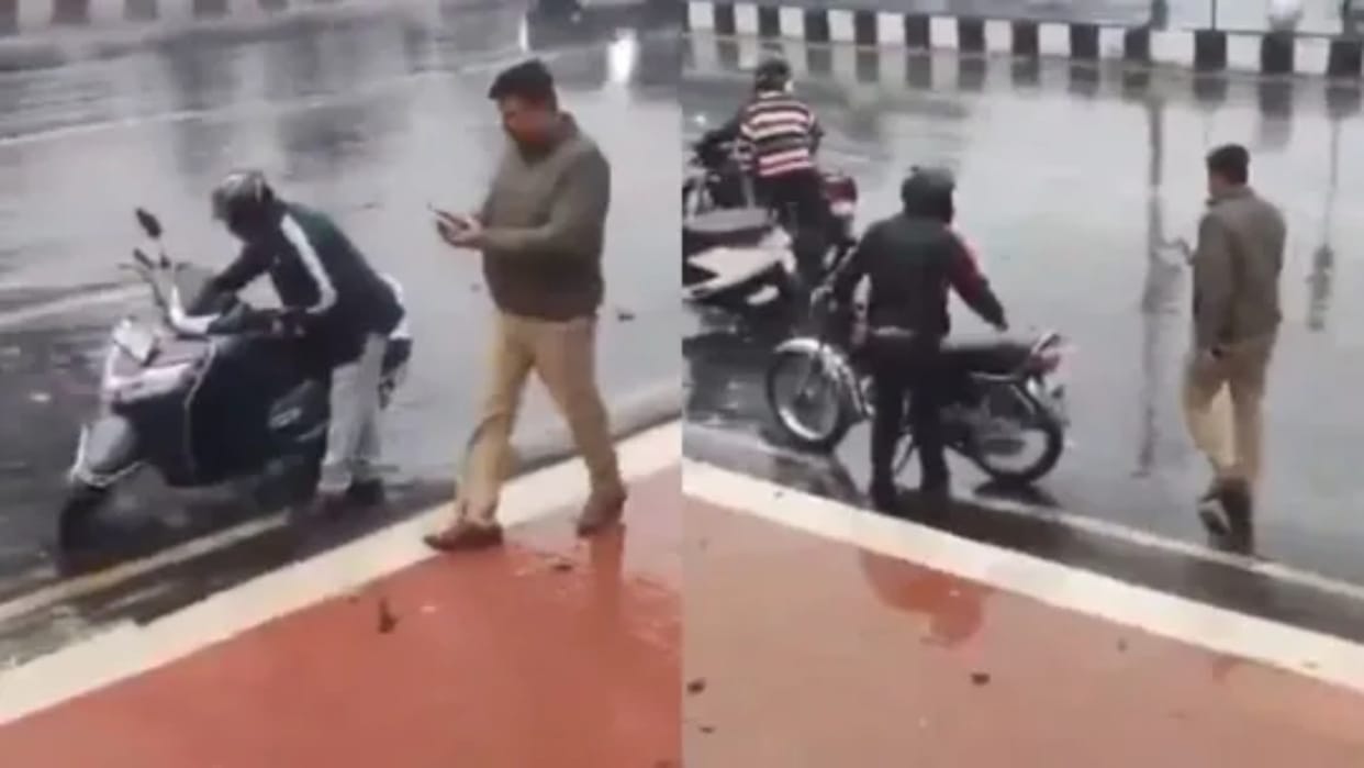Lucknow Police Cutting Challan Of People Hiding From Rain In Lucknow Video Viral