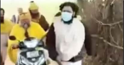 Saint Premanand reached the Yamuna riverbank from the ashram by riding a scooter.