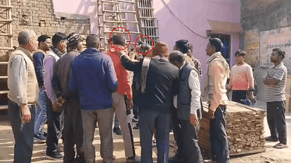 teenage girl publicly beat accused young man with shoe outside police station video