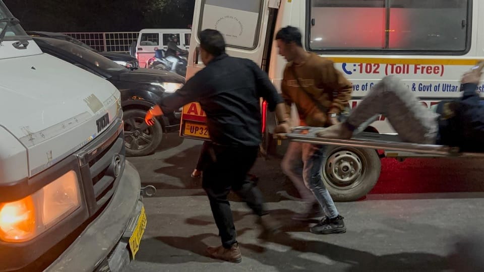 Three drivers trying to help an accident victim were crushed by a pickup van