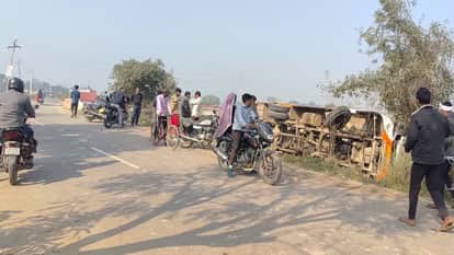 speeding bus carrying wedding guests overturned in the Sharda tributary canal, injuring two